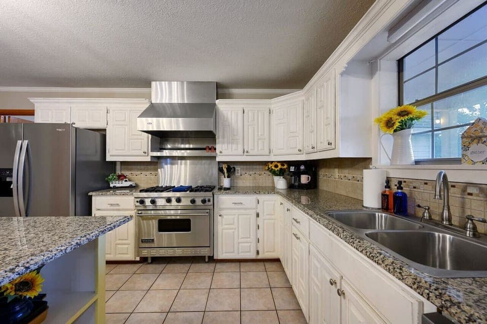 Cook in style with a sleek kitchen that combines modern elegance with functional design.