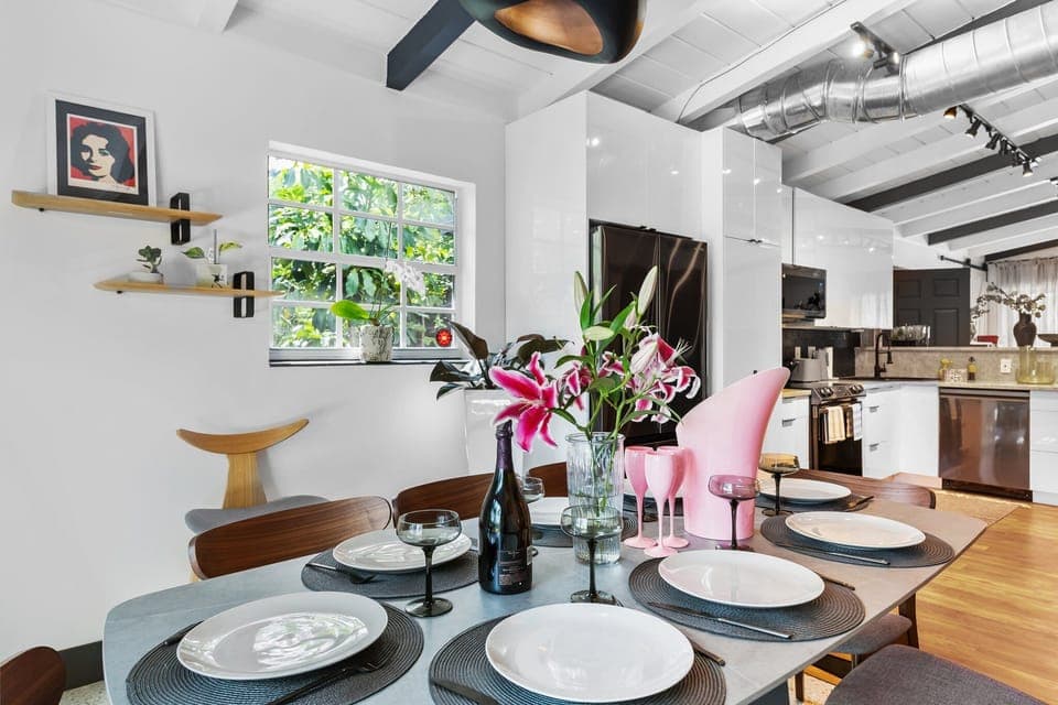 stunning dining room adorned by fine art 