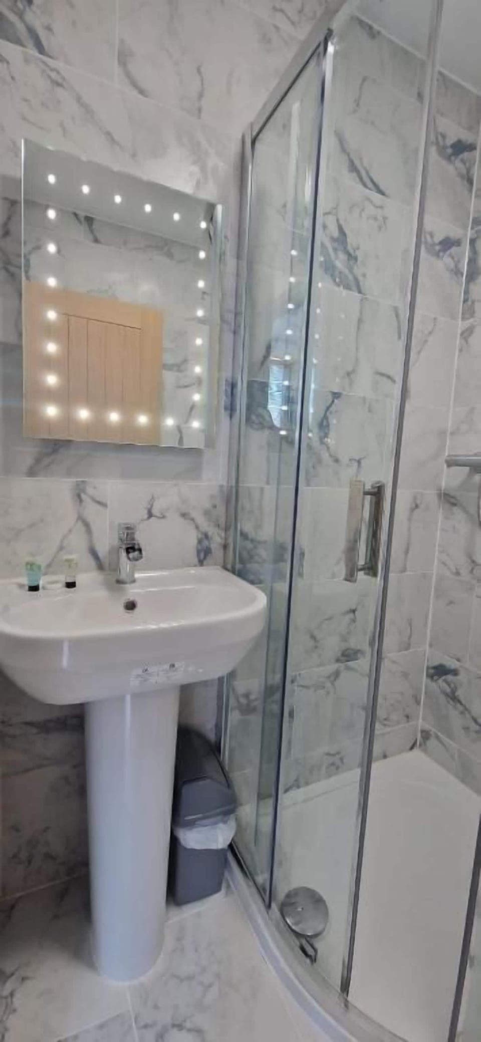 Rainfall showerhead, free toiletries, hair dryer, towels