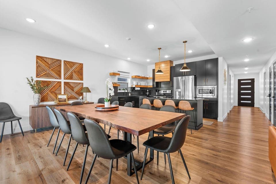 Gather around the custom live-edge table for meals, games, or conversation - all next to a fully equipped kitchen. seats the whole crew!
