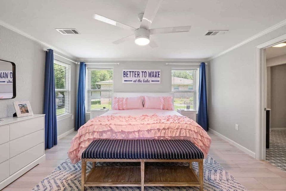 Main Bedroom, Wake up with views of the water. Room features phone chargers, sound machine and black out curtains  and a fan to make you feel at home.