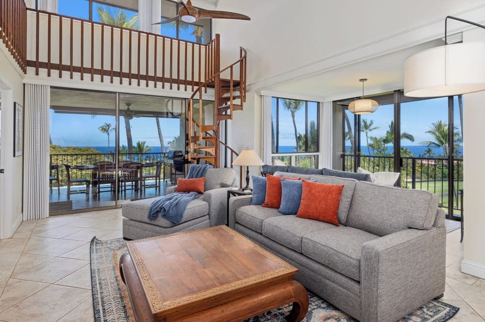 Living room panoramic daytime w/ 180° ocean view - Panoramic living room with nearly 180° ocean views — rare corner unit.