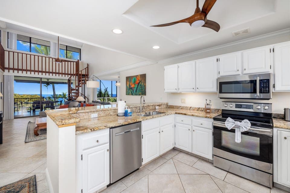 Kitchen w/ ocean view from entry - Open-concept kitchen with ocean view as soon as you walk in.