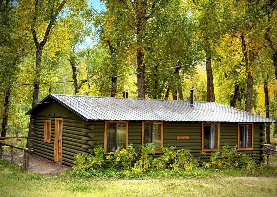 The largest cabin at TaTa Ranch with beautiful stream, pond and river views.