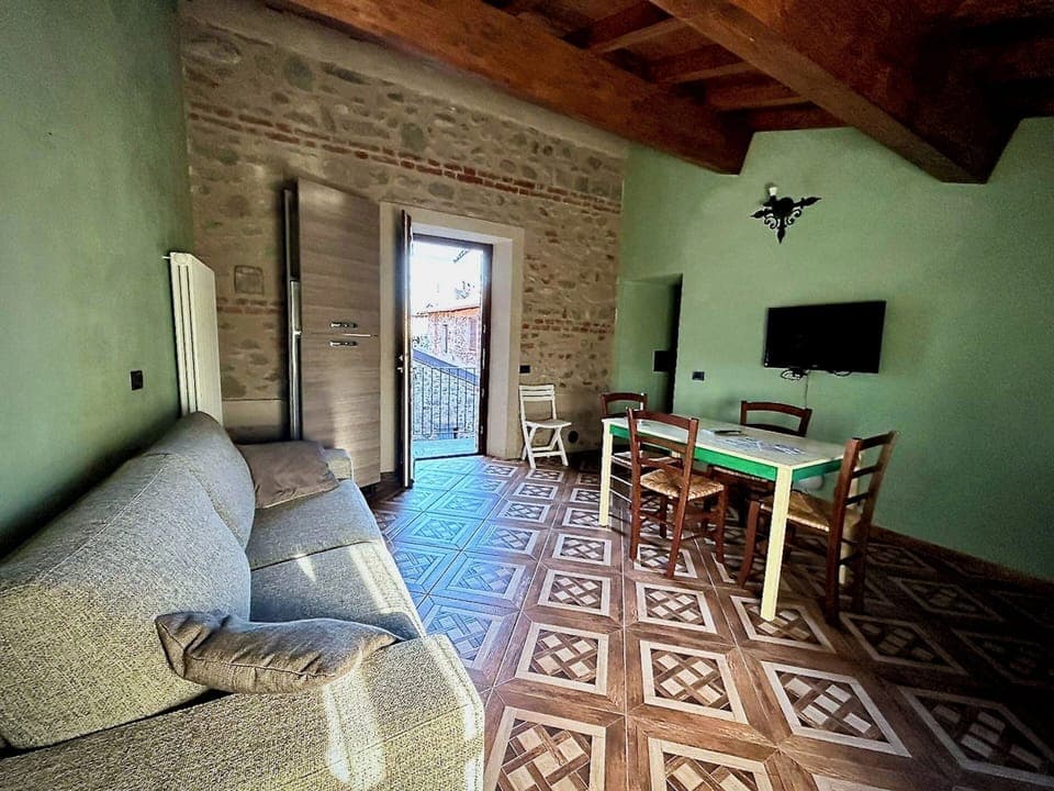 Classic Apartment | Living area | 36-inch flat-screen TV with satellite channels