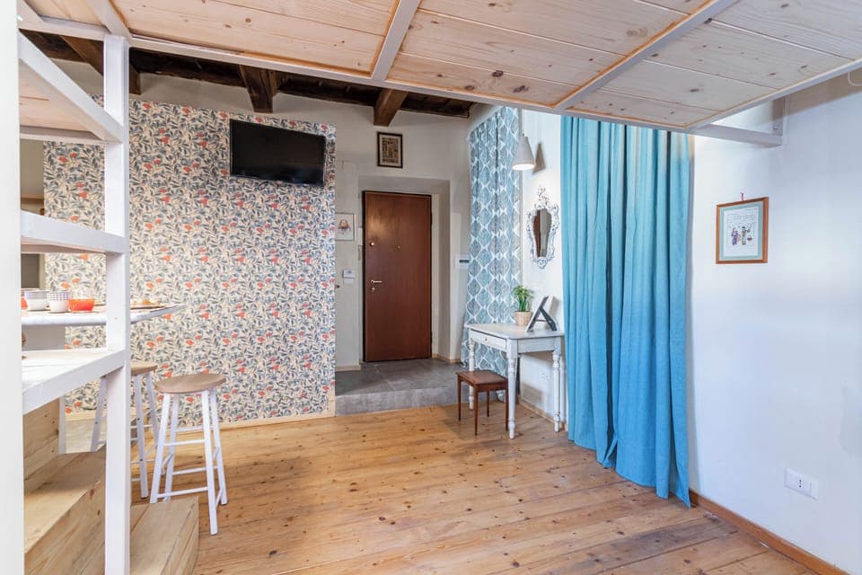 City Studio | Living area | 30-inch flat-screen TV with digital channels