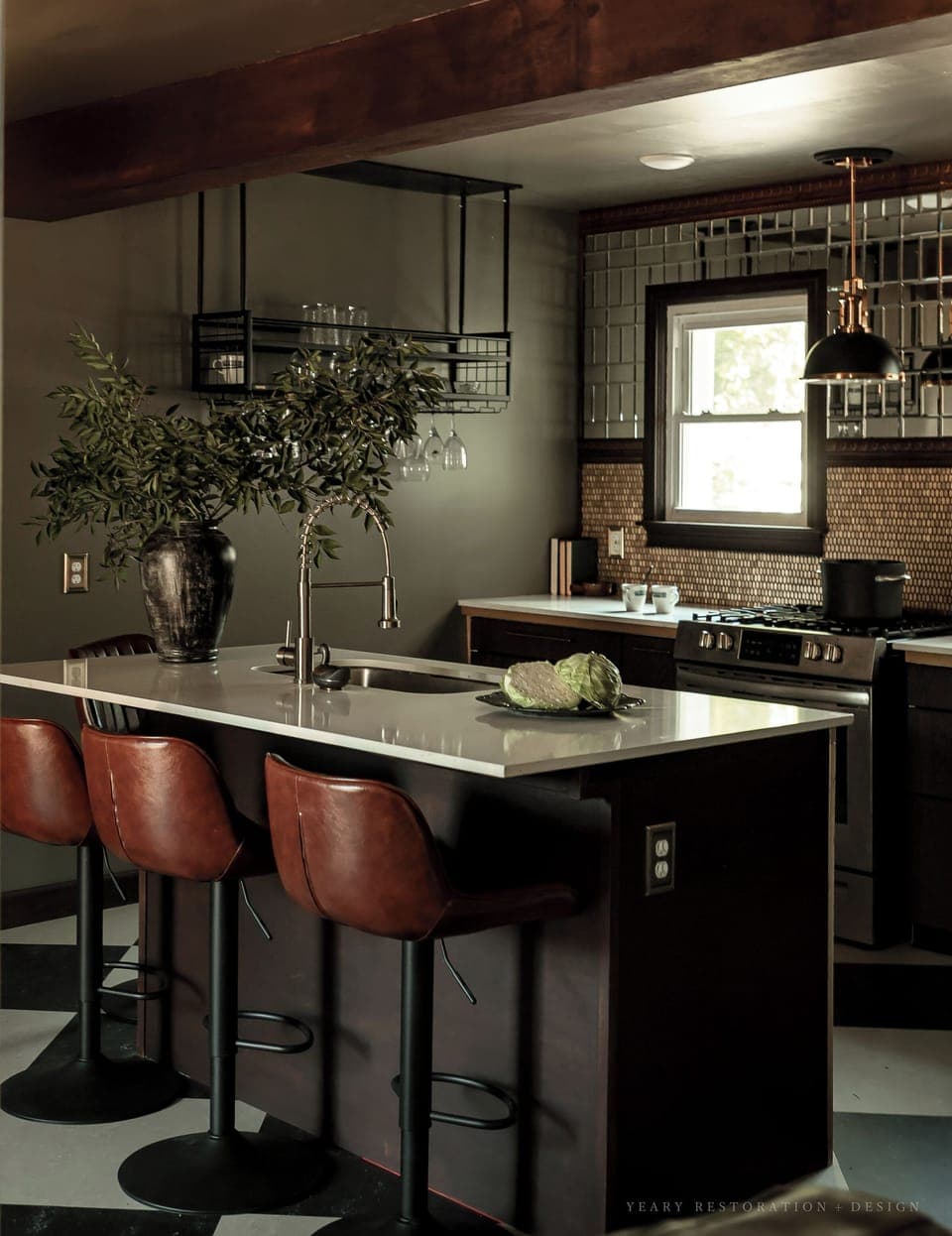 Full kitchen with mid size fridge/freezer, gas stove/oven, and kitchen island!