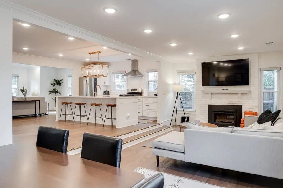 Living Room: A beautifully bright and expansive living room designed for comfort, light, and effortless relaxation.