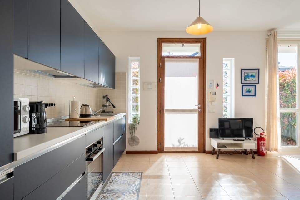 Apartment, Patio, Garden View | Private kitchen | Fridge, microwave, oven, stovetop