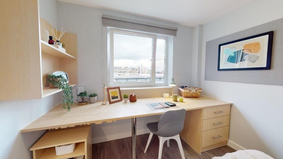 Desk, laptop workspace, free WiFi, bed sheets