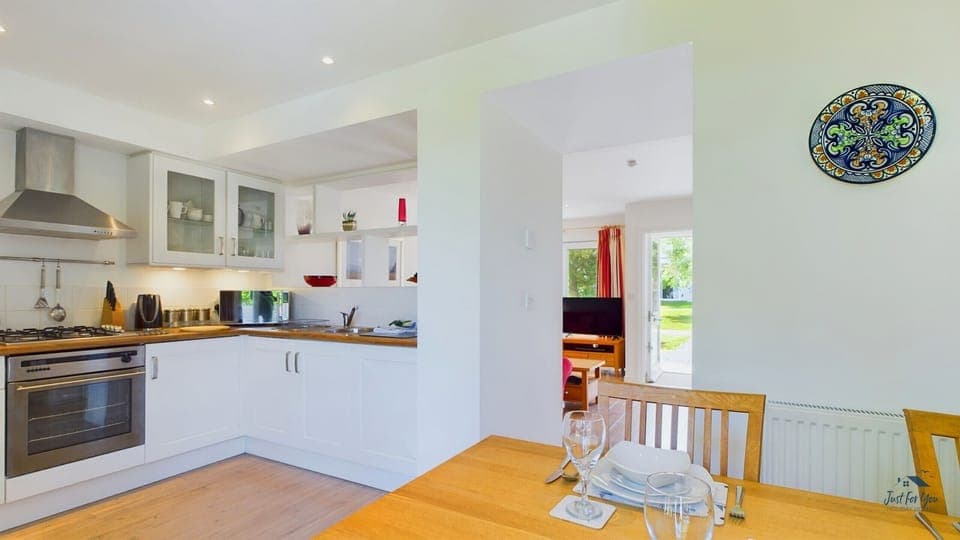 Open-plan kitchen, dining and sitting room.