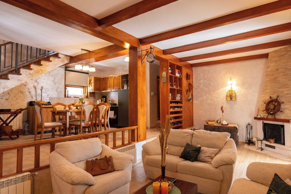 Living room opens to kitchen and dining area 