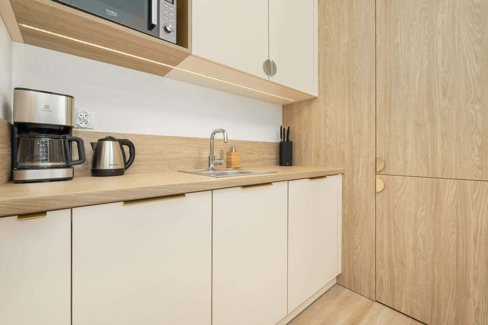 A bright and spacious kitchenette that encourages culinary exploration.
