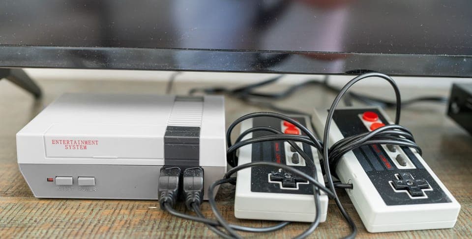 "Retro gaming console with classic controllers included."