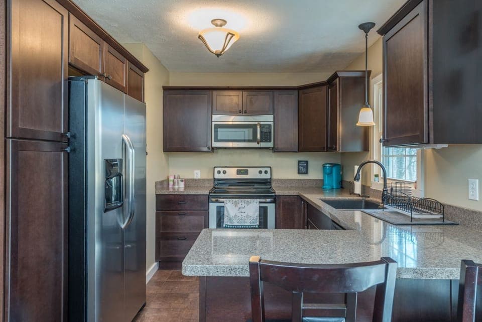 Whip up delicious meals in the kitchen complete with bar seating for 2, a dishwasher, and a Keurig coffeemaker.