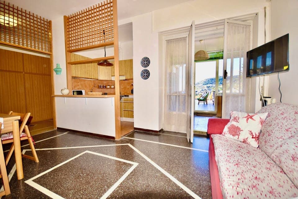 Apartment, Sea View | Living area | 30-inch flat-screen TV with digital channels