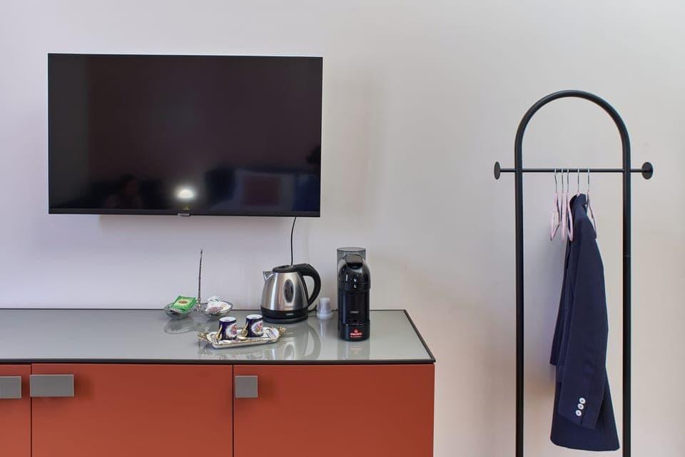 Luxury Room, City View | In-room safe, desk, laptop workspace, blackout drapes