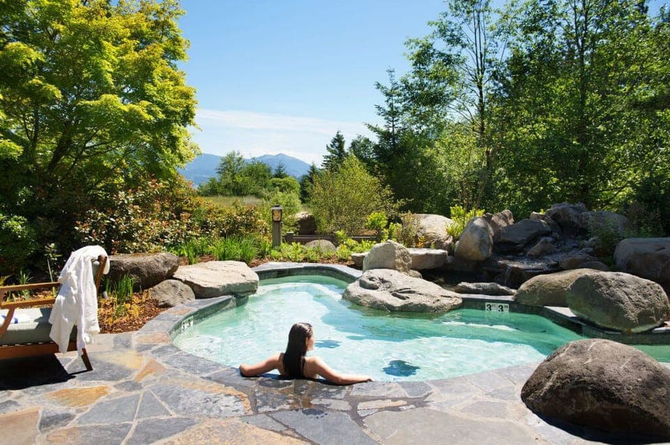 Unwind at the Skamania Lodge outdoor spa, surrounded by nature's beauty.