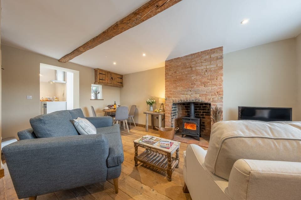 Willow Cottage, South Creake: Sitting room with wood burning stove