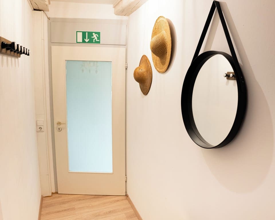 Entry Area with hooks for jackets & show rack