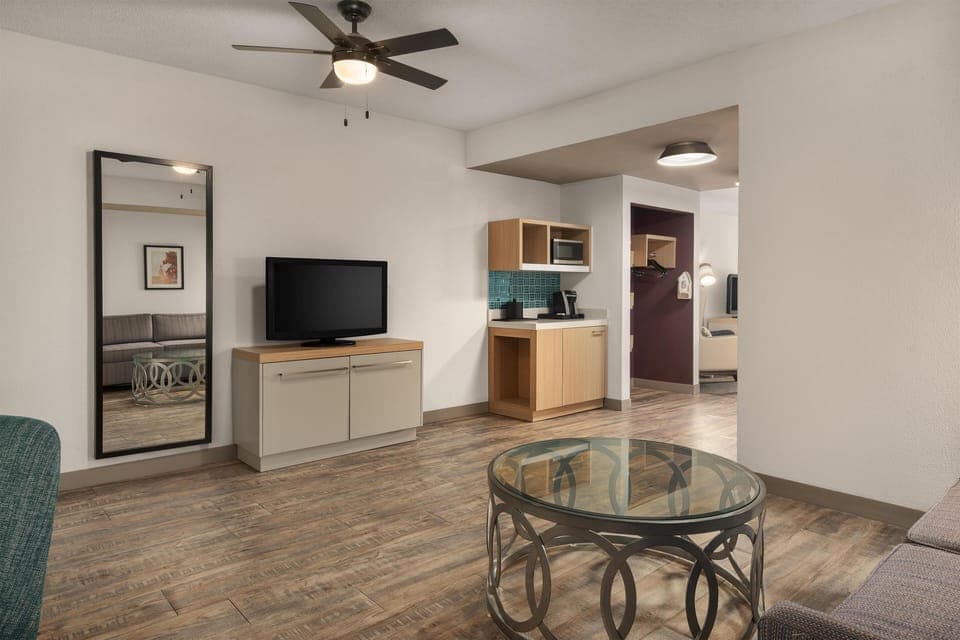 Junior Suite, 2 Queen Beds | Living area | 55-inch flat-screen TV with satellite channels