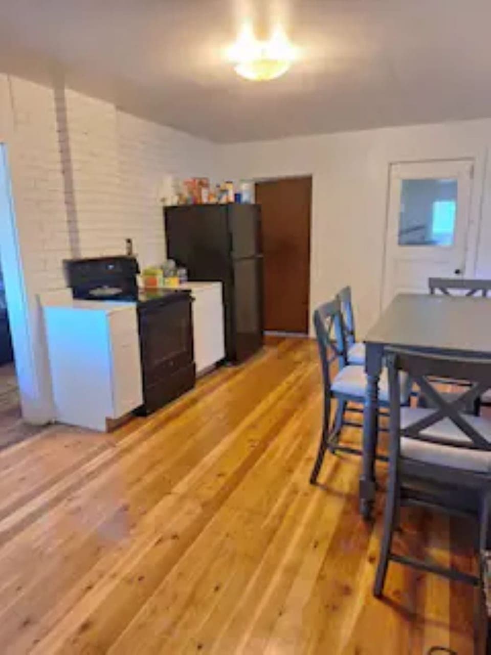 Kitchen stove and refrigerator. 
