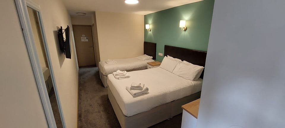 Room, Multiple Beds, Non Smoking | Desk, laptop workspace, free WiFi