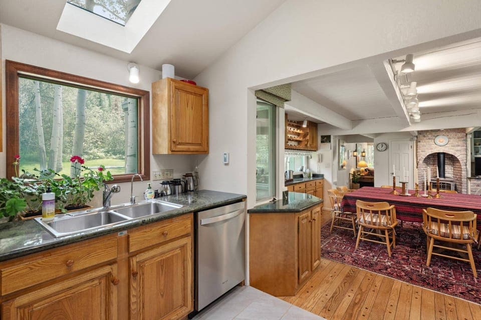 The kitchen is fully stocked and features new appliances and tons of counter and cabinet space.