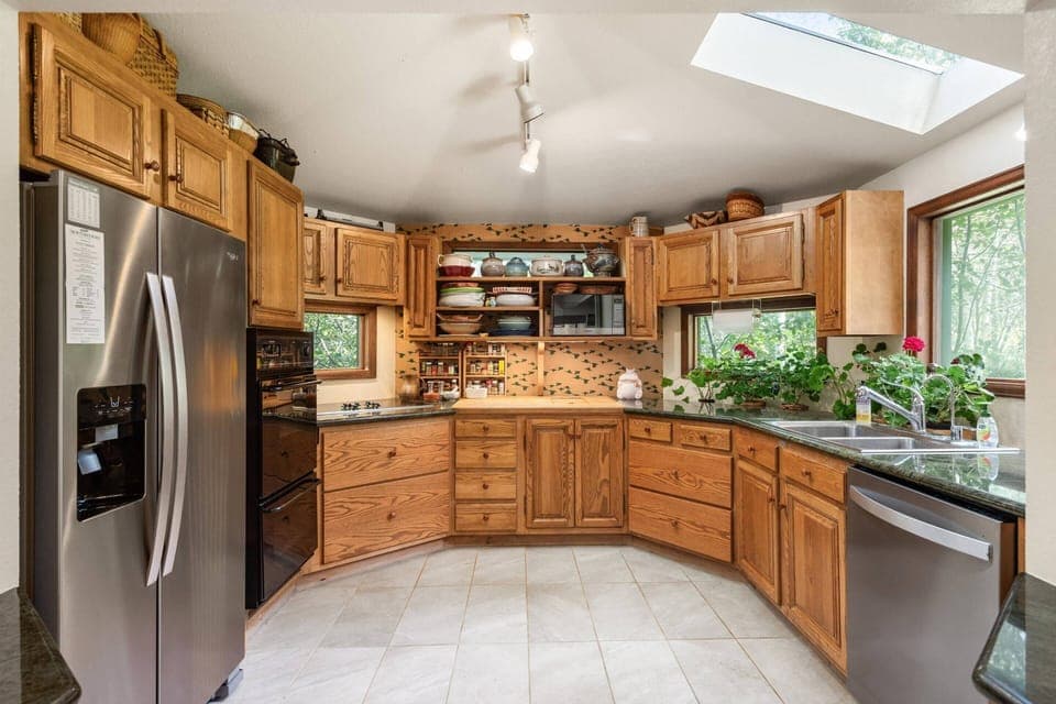A spacious kitchen and large dining table for 8 allows for your group to dine in style during your stay.