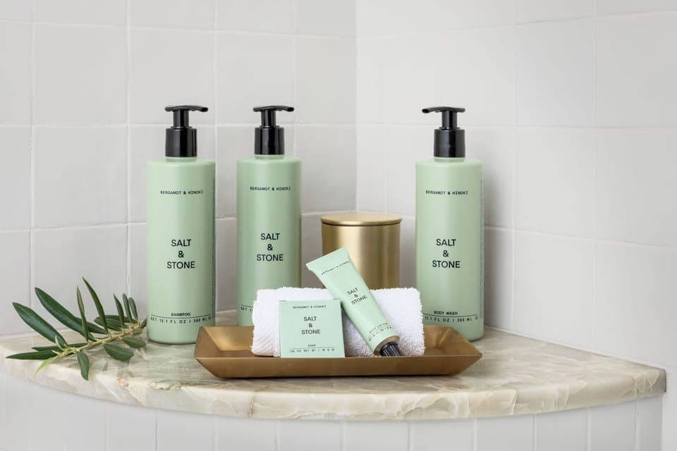Designer toiletries, hair dryer, bathrobes, slippers
