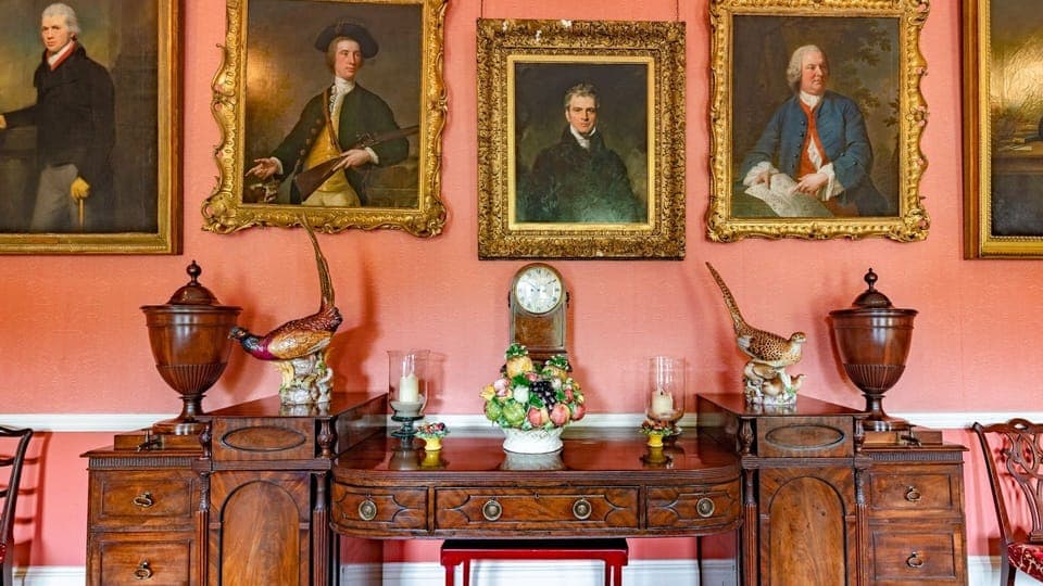 Fine paintings grace the walls of Kentchurch Court's banquet hall