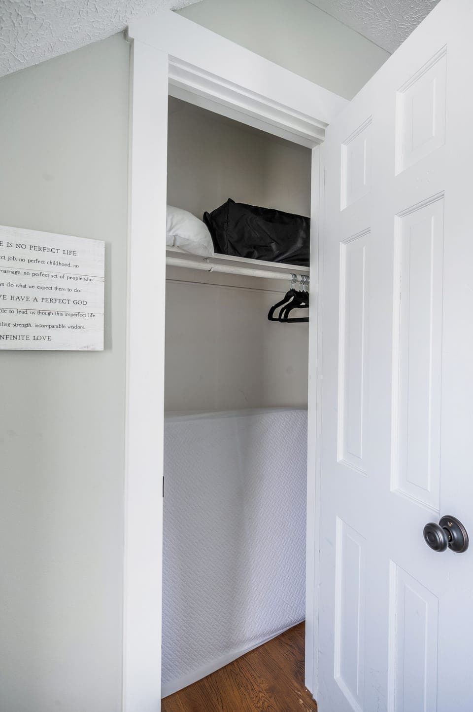 Bedroom #3 - guest closet w/ extra twin xl memory foam mattress & bedding that can be placed on the floor anywhere in the house for an extra sleeping spot (great for kids), velvet hangers, and luggage rack