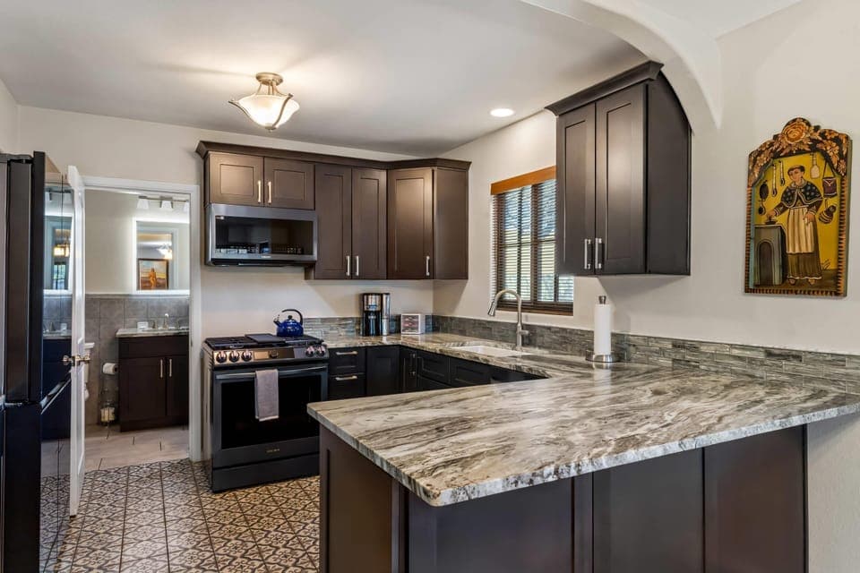 Suite, Multiple Beds, Non Smoking | Individually decorated, individually furnished, iron/ironing board