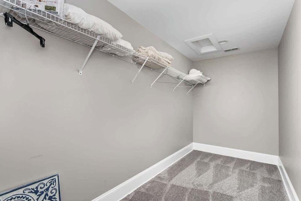 Walk-in closet space to keep any luggage so your space stays tidy throughout your stay.
