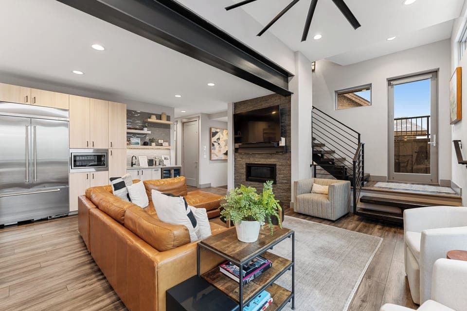 Open-concept living area with gas fireplace.