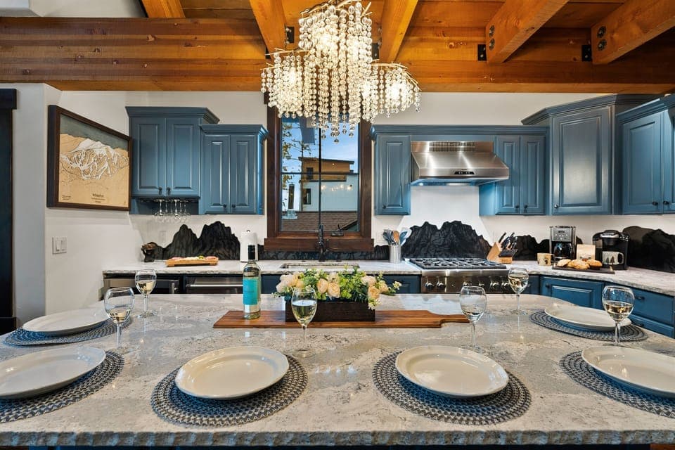The oversized island comfortably seats five, creating the perfect space for enjoying sit-down meals.