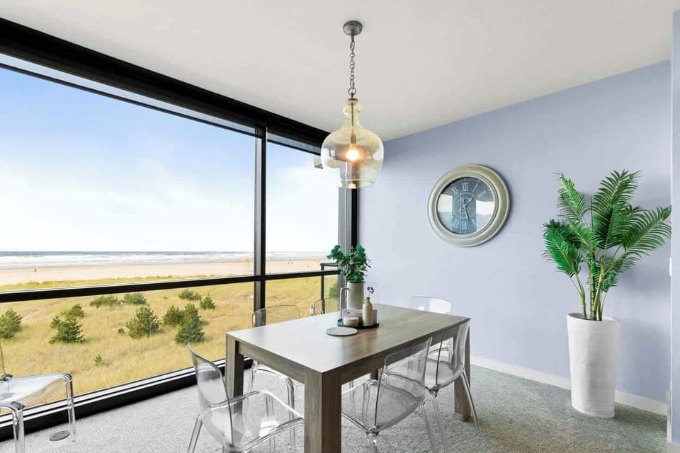 Meals are better here! Our dining table overlooks the beach, making every bite a delight.