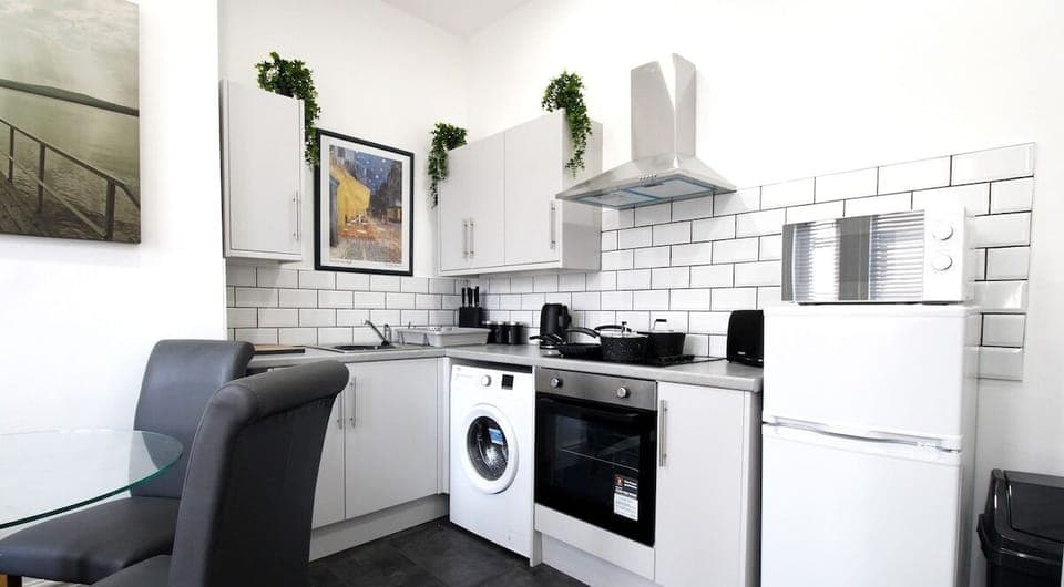 The kitchen is open plan to a lounge area comprising of an electric hob, fridge/freezer, use of a washing machine and lovely fitted cupboards with lots of storage. Added extras are included in your stay with TV, microwave, kettle and toaster.