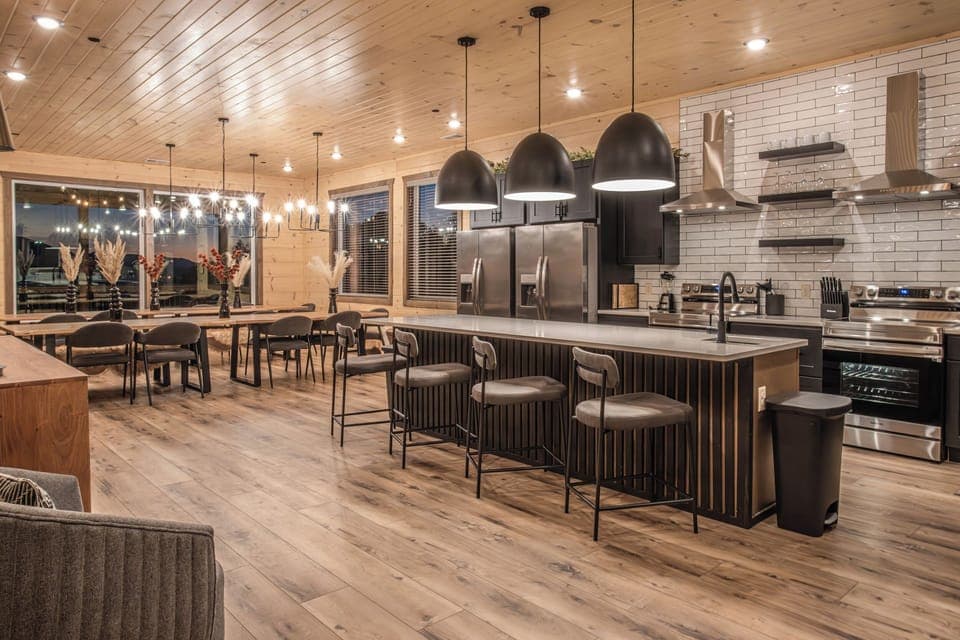 Enjoy stylish countertop seating with a seamless flow to the dining area, offering an open view of the beautifully appointed kitchen.