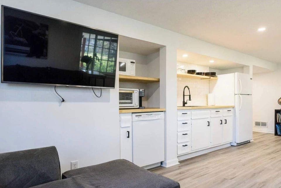 Living Room: Our living area offers the perfect spot for lounging, with a TV setup for all your entertainment needs!