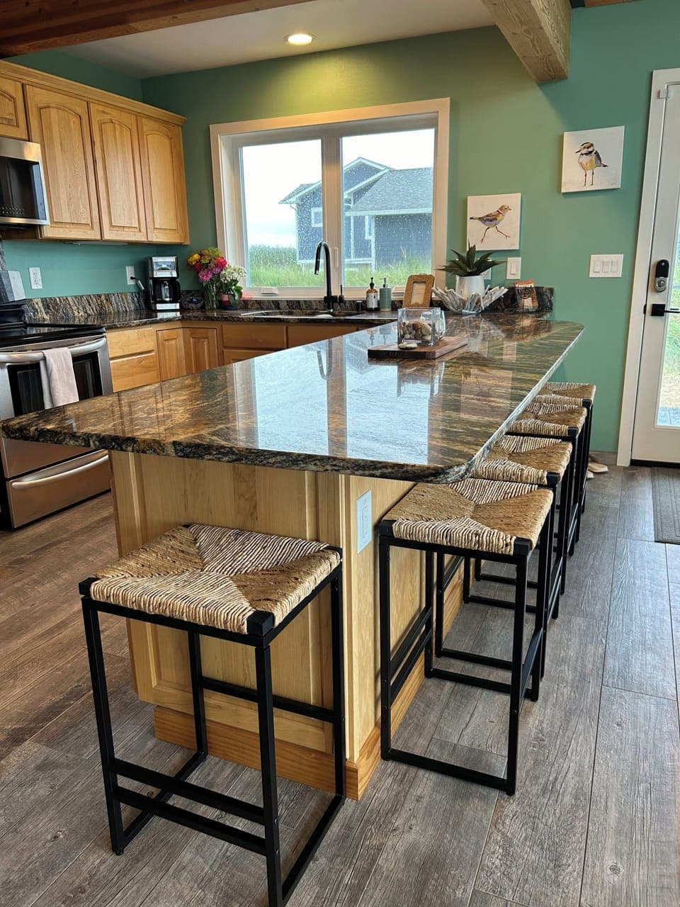 Beautiful granite island to entertain while cooking & entertaining with a view