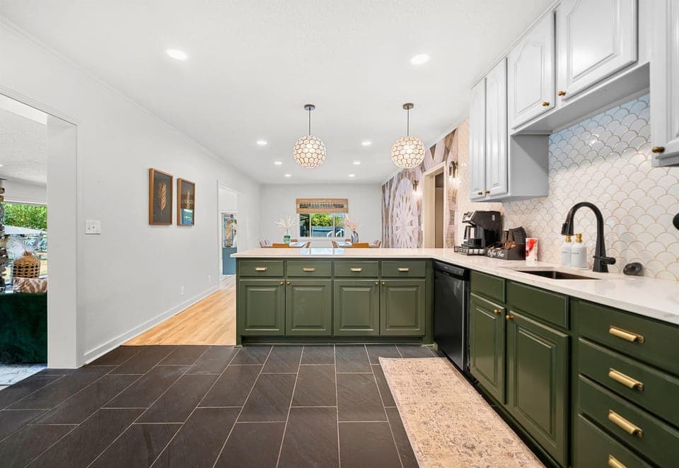 The bright, airy kitchen invites you in with its open layout, perfect for gathering and meal prep.