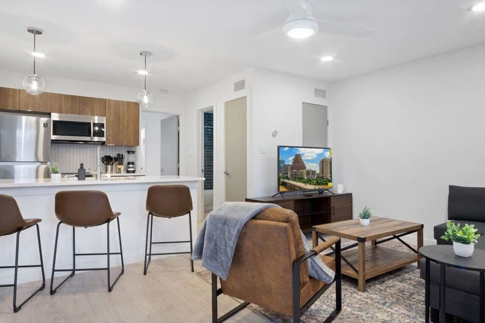 Once you enter the living room you'll find a space that feels both luxurious and cozy, perfect for unwinding after a long day.