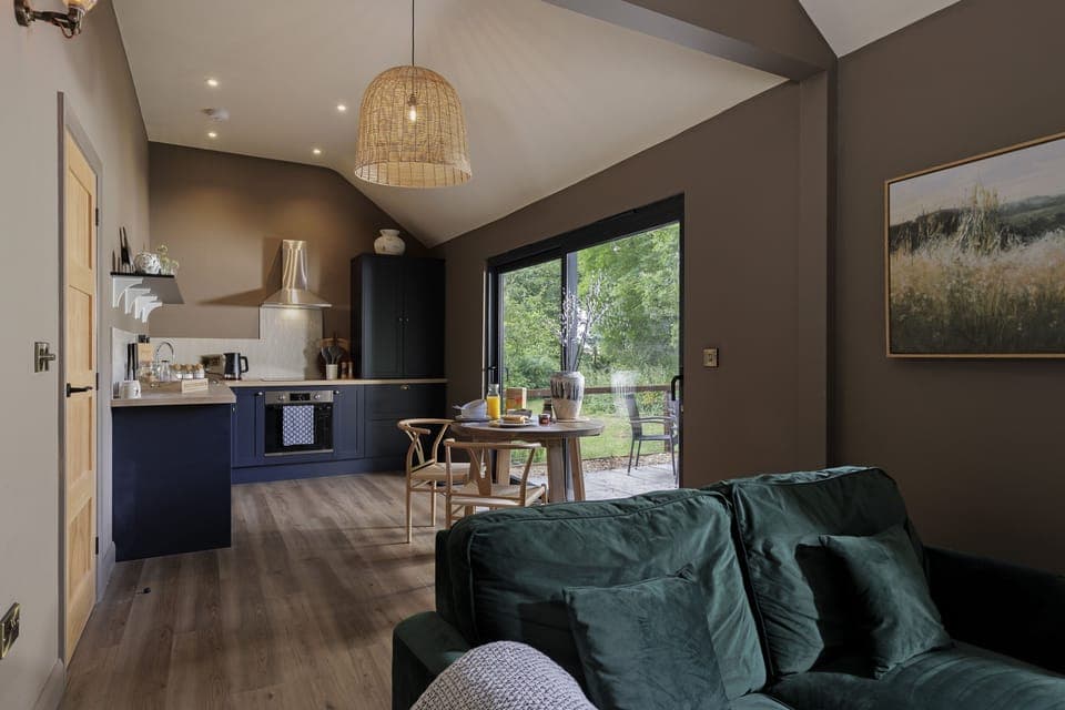 Open-plan living area leading to the bedroom