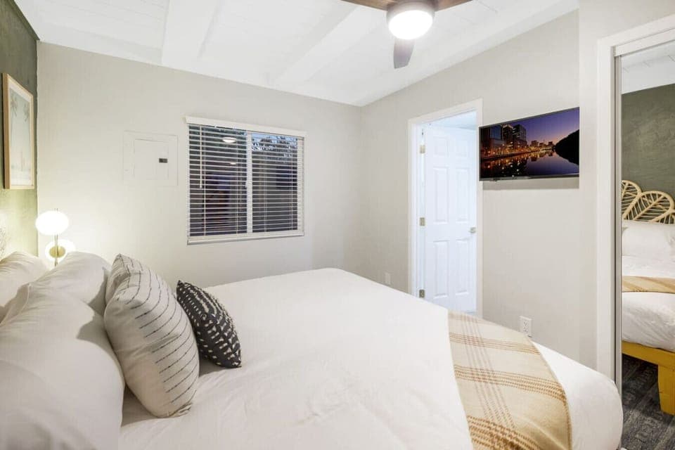 Experience true comfort in the master bedroom with a plush king-size bed, perfect for a restful night.