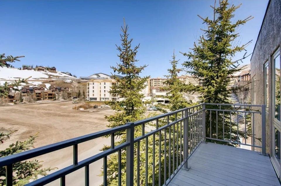 Step onto the private balcony and take in breathtaking scenic views of the snow-capped mountains, with a serene backdrop that enhances the alpine experience.
