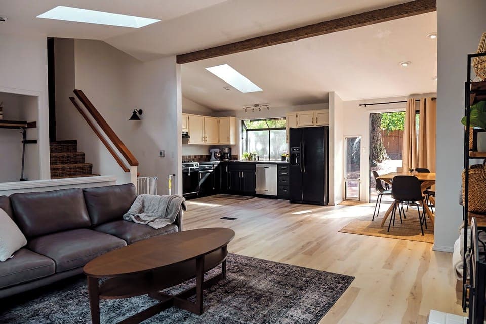 Large, open main floor with living/kitchen/dining. 