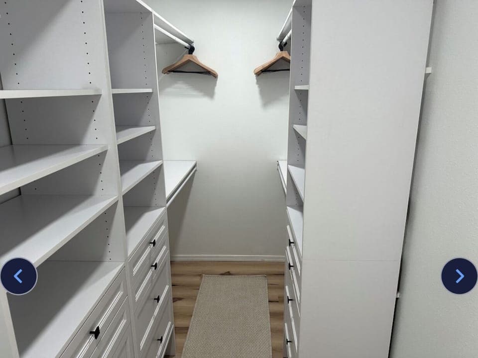 Large walk-in closet is attached to the King Bed fireplace suite & hall bathroom