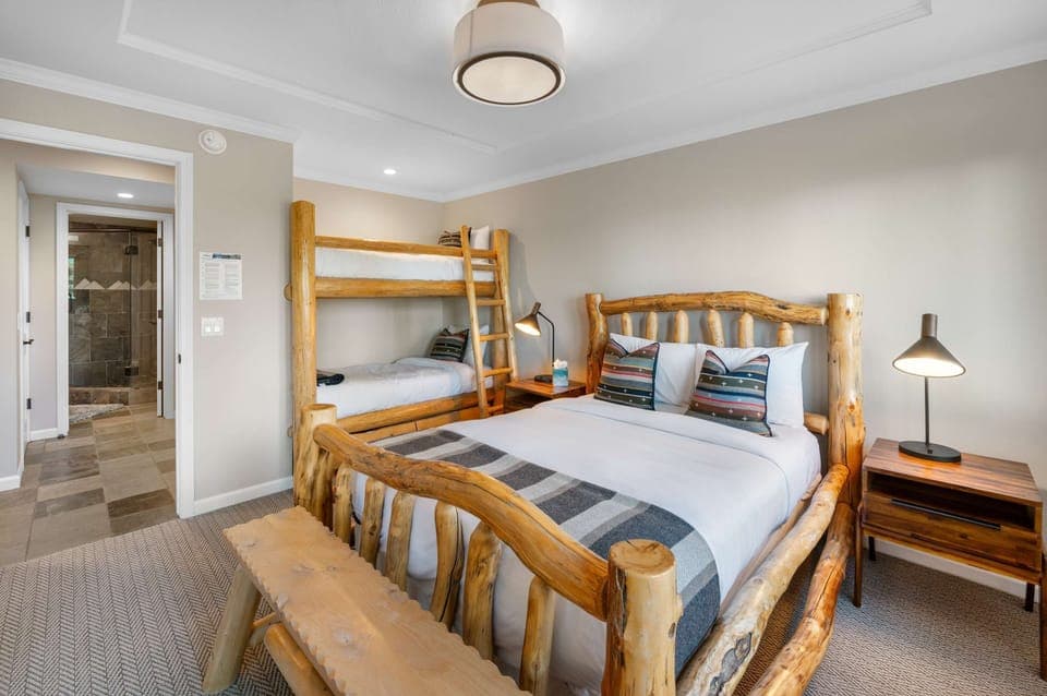 Bedroom 6: Bunk room, twin over twin bunk bed, 1 full bed, closet, 42” Smart TV, lower floor