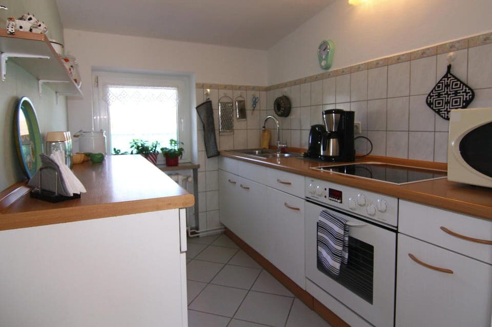 Apartment | Private kitchen | Electric kettle, toaster, highchair